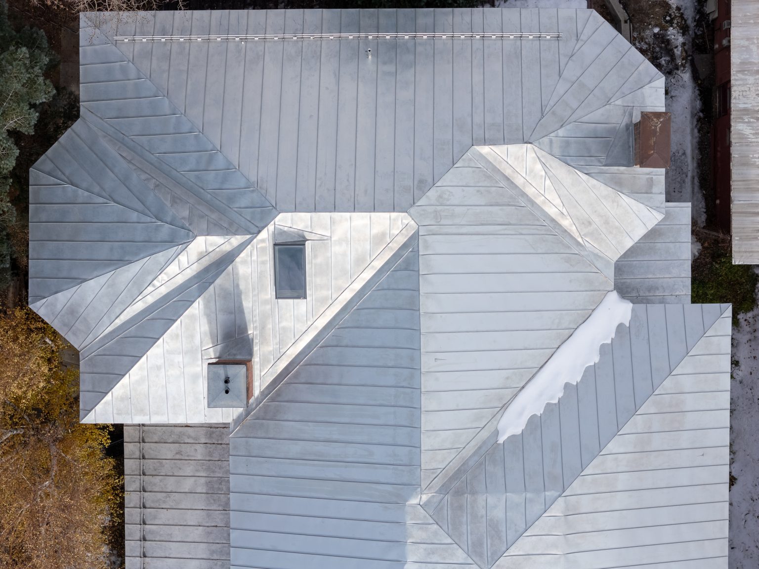 Top down view of sheet metal roofing atop the Ouray County Historical Museum.
