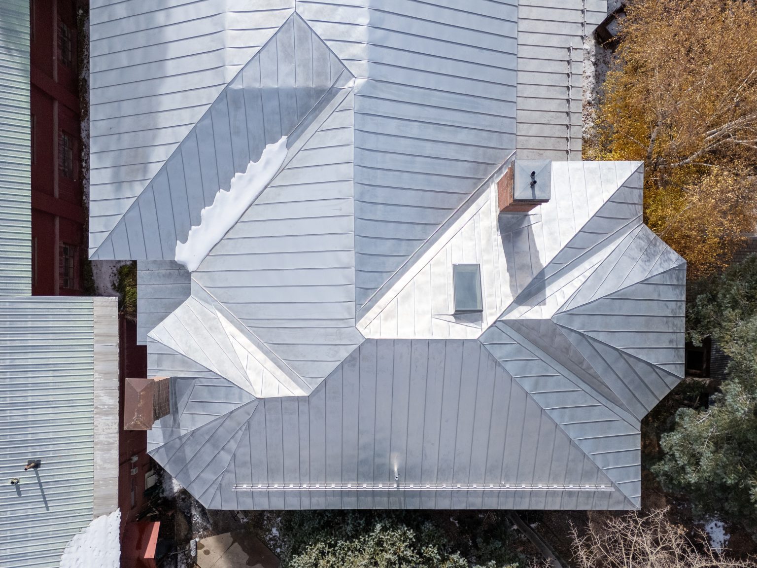Top down view of sloped sheet metal roofing atop the Ouray County History Museum.